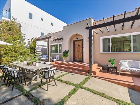 Photo of 1110 Queen Anne, Los Angeles, CA 90019 (MLS # SB25255979)
