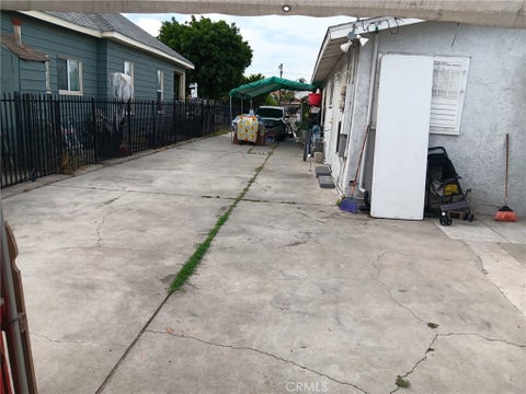 Photo of 415 95th Street, Los Angeles, CA 90044 (MLS # DW26187276)
