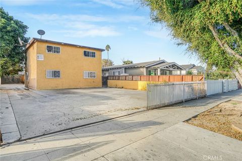 Photo of 1548 W 59th Place, Los Angeles, CA 90047 (MLS # SB25238468)