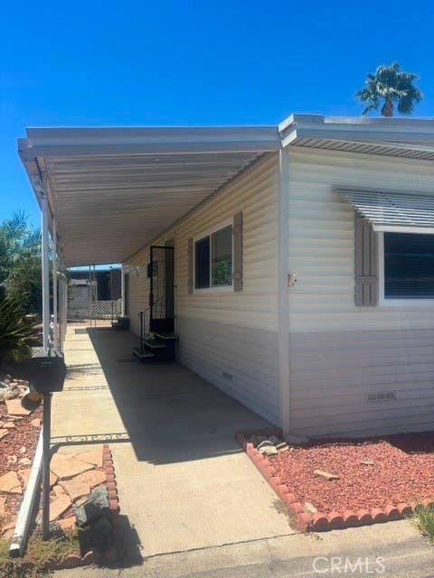 Photo of 8301 Mission Gorge Road RD #113, Santee, CA 92071 (MLS # SW26185347)