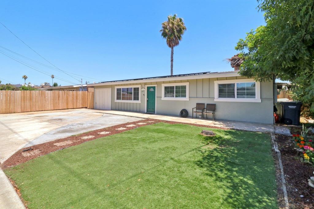 Remodeled single-level home in Escondido! This beautifully updated property features an open floor plan with crown molding, recessed lighting, and durable flooring throughout. The renovated bathrooms offer modern style, while the custom eat-in kitchen will take your breath away—boasting sleek quartz countertops, high-end stainless steel appliances, and a convenient breakfast island, perfect for cooking and entertaining. The primary bedroom includes a walk-in closet and its own en-suite bathroom. A versatile bonus space can easily serve as a home office, guest room, or hobby area. Situated on a generously sized lot, the home provides ample outdoor space, including a huge backyard with low-maintenance landscaping and a covered patio—ideal for relaxing or hosting gatherings. Additional highlights include solar and a Tesla charging station on site. This move-in-ready gem blends comfort, function, and energy efficiency—don’t miss your chance to make it yours!