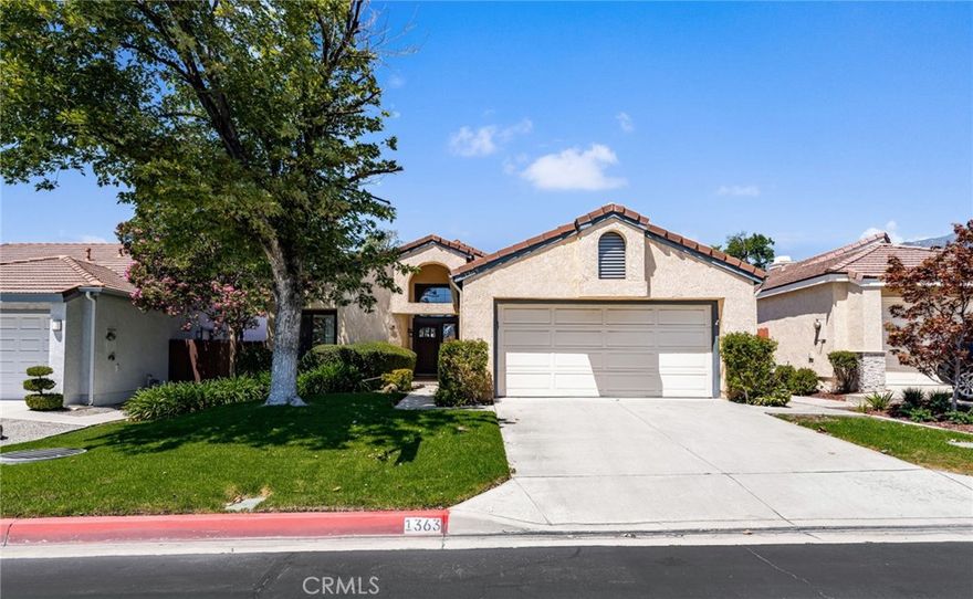 Welcome to this lovely two-bedroom, two-bath home located in the highly desirable gated community of Acacia Park in North Upland. Perfectly positioned to take advantage of the community amenities, residents can enjoy sparkling pools, relaxing spas, and  multiple sport courts. Conveniently accessible off Benson Avenue, this home also offers breathtaking mountain views.

Step inside to a warm and inviting living space featuring cathedral ceilings and abundant natural light streaming through picturesque windows. The open design creates a bright and airy atmosphere, making the home feel both spacious and comfortable.

Additional highlights include laminate flooring, upgraded restrooms and kitchen and an oversized attached two-car garage with ample driveway parking, beautifully landscaped grounds, and a charming garden space. The expansive outdoor patio provides the perfect setting for entertaining or simply enjoying cooler evenings under the stars.

This home is a wonderful opportunity to enjoy both comfort and community in a prime accesible Upland location.