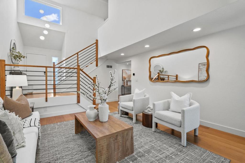 Welcome to this beautifully remodeled 3-bed, 2.5-bath townhome in the desirable Copperwood community. Offering 1,451 sqft of comfortable and updated living space, this home features a bright open floor plan with vaulted ceilings, designer pendant chandelier, and brand new LVP flooring throughout. The spacious living room includes soaring ceilings, fireplace and ample natural light. The updated kitchen provides ample cabinet space, stainless steel appliances, and sliding door to patio access. Upstairs, the primary bedroom retreat boasts vaulted ceilings, sconce lights, a spacious closet with organizing system, and a luxurious en-suite bathroom with quartz vanity and oversized stall shower. Two additional bedrooms feature generous closets and natural light. A second full bathroom includes a quartz dual vanity and shower over tub. Attached two-car garage with laundry and storage. Enjoy community walking paths, mature landscaping, pool, and lounge areas. Excellent Almaden location near parks, shopping, restaurants, Almaden Country Club, hiking trails, and quick access to Almaden Expressway, HWY 85 & 87. A must-see!