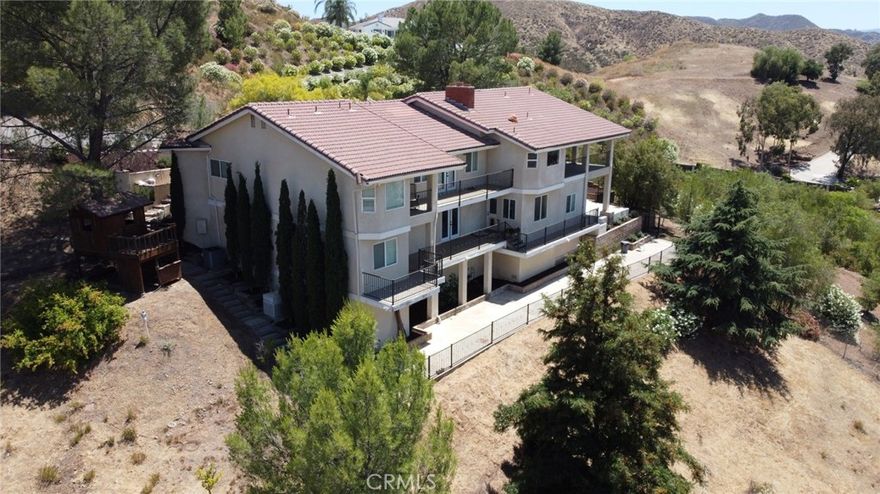 Welcome to this exceptional 4,048 sq. ft. home, fully renovated and situated on a sprawling 3.28-acre lot in the prestigious Canyon Lake Estates. This exclusive community boasts only 18 acreage estates, offering both privacy and luxury living with no close neighbors.



Featuring 4 spacious bedrooms and 4.5 bathrooms, this home is designed for comfort and elegance. Two master suites—one on each floor—provide convenience, while the additional two bedrooms come with their own private bathrooms, ensuring privacy for all family members or guests.



The heart of the home is the gourmet kitchen, perfect for entertaining. It includes two sinks, two dishwashers, and a 48" built-in refrigerator, catering to the needs of any chef. The home also offers a formal dining area, a cozy reading room, and a dedicated office space, ensuring ample room for both relaxation and productivity.



The property’s unique layout includes two living rooms, one on each floor, allowing for versatile living spaces. The front yard features an oversized driveway and RV parking, providing plenty of room for all your recreational vehicles and toys.



Included in the price is a 46-panel, fully paid-off solar system grandfathered into Net Metering 2.0, delivering long-term energy savings and locked-in utility credits no longer available under current programs.



Step outside to breathtaking views from both stories, overlooking serene Canyon Lake. What sets this property apart from the rest in Canyon Lake Estates is its rare combination of spectacular views and flat land suitable for building. While most homes in the Estates either have a view with no flat land or flat land with no view, this home offers the best of both worlds. The expansive flat areas are perfect for building additional structures, a pool, or sport courts, while the gently rolling hills present an ideal opportunity to grow a vineyard.



Zoned for horses and other animals, there is ample space to build a barn, stables, and horse arenas. An easement at the bottom of the parcel offers flexible access and a multitude of options for use. Whether you envision a tranquil retreat or an active lifestyle, this property can accommodate it all.



This unique home combines luxury, functionality, and the beauty of nature, making it a rare find in the coveted Canyon Lake Estates. Don’t miss the opportunity to own a piece of this exclusive community with some of the best views, ultimate privacy, and versatile land options available.