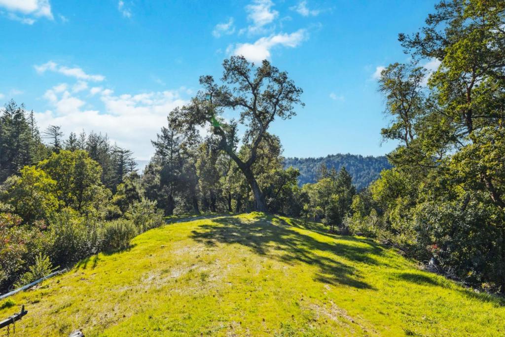 Escape to your own private retreat with this incredible 10-acre parcel, offering end-of-the-road privacy and breathtaking panoramic views of the entire valley. Whether you're looking for a peaceful getaway, a recreational paradise, or a quiet homestead, this property offers endless possibilities. Enjoy miles of natural beauty with scenic trails leading down to a tranquil creek, perfect for exploring, hiking, or simply unwinding in nature. The land receives full sun exposure, making it ideal for gardening and homesteading. The expansive, flat, and usable area is accessible via an access point. With its combination of privacy, stunning vistas, and diverse terrain, this property is perfect for those seeking space, solitude, and connection to nature. Whether you're an outdoor enthusiast, a gardener, or simply looking for a serene escape, this land is ready to bring your vision to life.