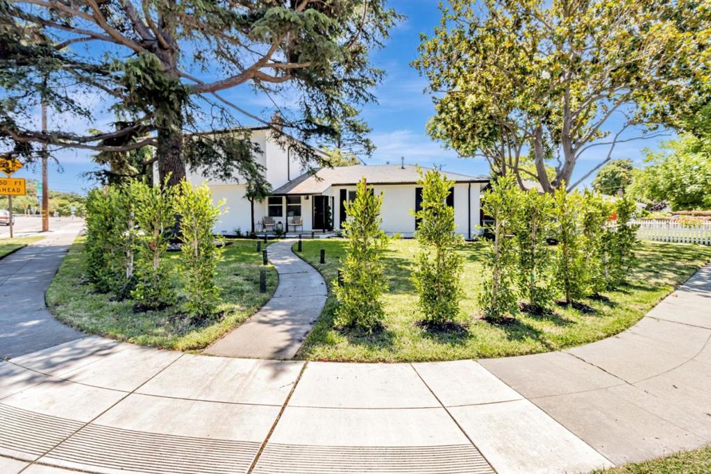 2 houses for the price of 1. Close proximity of San Jose prestigious Rose-Garden neighborhood 2 min from Valley Fair Mall and Santana Row. Within few minutes from Nvidia, Apple, Roku, Paypal, Google. This fully updated home offers a park-like setting for the extended family. Upon entry you will find open-concept spacious 3 bedrooms 2 bathrooms that offer both practicality and style with designer updates throughout the house. The triple pane windows offers comfort and low noise level. All updated modern recessed lighting, bath fittings, fresh paint inside and outside. Epoxy coated Garage floor and freshly designed outside area makes this a true turn key home. All new appliances, washer and dryer included. A separate 1 bed/1 bath plus living room ADU with its owm fully stacked kitchen with all new cabinets, appliances and quartz countertop, luxury flooring, light bars and very practical separate entrance, perfect for in-laws or extended family, or instant generating income ($2800-$3200) with airbnb/rental to offset payment. Corner lot means more space, less neighbors and access from both sides. Unbeatable price $986/ sqft makes this fully updated house a rare deal and waiting to meet its new family. Book your showing today