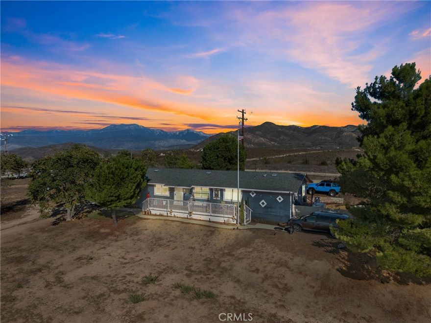 4 bed, 2 bath manufactured home on permanent foundation situated on 6 acre of land. Spacious layout with split-bedroom design. Home needs some cosmetic updates—perfect for a buyer looking to add personal touches. Large, usable lot offers endless possibilities. Great opportunity for investment or country living.