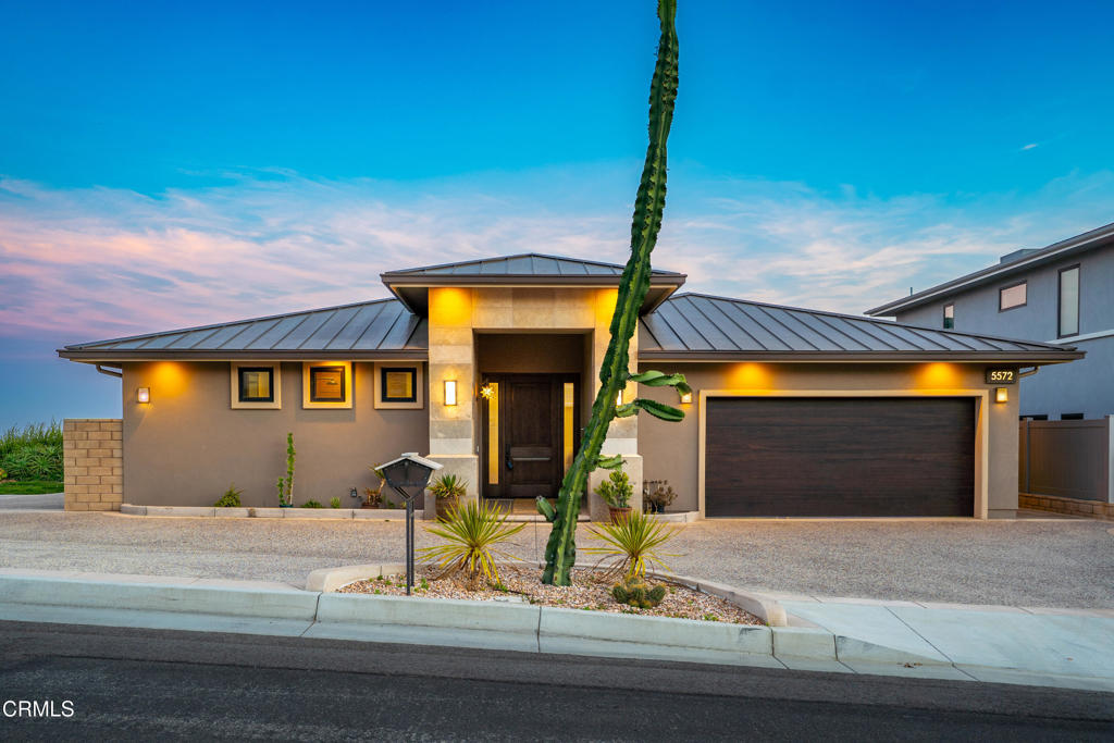 An exceptional offering in Ventura, a stylish 2-bedroom, 3-bathroom home is being sold with the adjacent land lot, creating a unique opportunity for expansion, investment and added privacy. Positioned in a prime location with this newer construction residence features an open layout, modern finishes with a rare entitled roof-top patio with a fire place, offering expansive unobstructed views of surrounding ocean and islands, perfect for entertaining and relaxing. The chef-inspired kitchen is equipped with top-tier appliances, complemented by a generous central island perfect for both culinary endeavors and social gatherings. The spa-like bathrooms serve as serene retreats, featuring luxurious touches designed to promote relaxation and tranquility. The beautifully landscaped garden provides an intimate, private oasis - ideal for enjoying the outdoors in peace and seclusion. The extra parcel offers immense potential for further development, whether expanding the current residence or creating a separate estate, adding a level of versatility to this extraordinary opportunity.