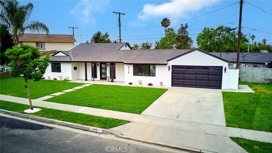 Welcome to 615 S Hazelwood Street — a fully reimagined Anaheim residence offering modern living with timeless appeal. This stunning single-family home has been completely renovated inside and out, showcasing an open-concept layout with natural light, premium finishes, and a seamless flow ideal for both entertaining and everyday comfort.



The designer kitchen features custom cabinetry, quartz countertops, stainless steel appliances, and a large island that anchors the living space. The home offers three spacious bedrooms and two beautifully updated bathrooms, including a primary suite with a private ensuite and direct access to the backyard.



Every detail has been thoughtfully upgraded — from new flooring, recessed lighting, windows, and doors to updated electrical, plumbing, and HVAC systems. Outside, enjoy a private backyard perfect for entertaining, relaxation, or adding an ADU for additional income or family use.



Located minutes from Disneyland, shopping, dining, and major freeways, 615 S Hazelwood Street delivers a rare blend of quality, design, and convenience in one of Anaheim’s most established neighborhoods. A turnkey opportunity ready for its next owner.