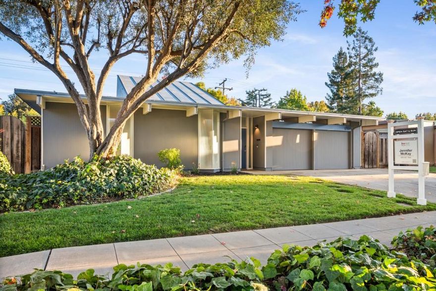 Stunning modernized Eichler in San Joses sought-after Fairglen neighborhood! Completely renovated from top to bottom, this home blends mid-century charm with modern comfort and convenience.  Signature Eichler features have been thoughtfully preserved  open-beam ceilings, walls of glass, and seamless indoor-outdoor flow  now enhanced with fresh design and thoughtful updates. The centerpiece of the home is a covered atrium with a striking half-gable roofline, accessed by a graceful spiral staircase, creating a dramatic and inviting entry point that fills the home with natural light.  The open-concept kitchen features sleek cabinetry, quartz countertops, premium stainless appliances, and an oversized island perfect for gatherings. Spacious living and dining areas open to a private backyard, ideal for entertaining or quiet evenings. Spa-inspired bathrooms showcase designer finishes, custom tilework, and frameless glass showers.  Enjoy year-round comfort with a new central heating and cooling system featuring individual split-unit controls, updated electrical and plumbing, and energy-efficient upgrades. Every surface has been renewed, creating a home that feels both timeless and brand new  the perfect blend of Eichler design and modern living.