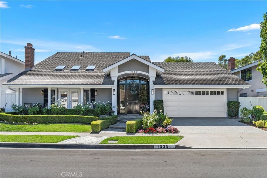 Welcome to 1935 Port Bishop Place, a coastal classic in the coveted Port Streets of Newport Beach. Just steps from the greenbelt, Andersen Elementary, and the community pool, this beautifully updated residence combines timeless design with modern comforts and an effortless indoor/outdoor lifestyle. A dramatic entry with a curved staircase and soaring ceilings sets the stage, while hardwood floors flow throughout the open concept main level. The remodeled chef’s kitchen, appointed with granite countertops, high-end appliances, and abundant storage, seamlessly connects to the dining and living areas for easy entertaining and everyday living.



Two sets of double doors open the great room to an entertainers dream backyard with a built-in BBQ island, expansive hardscaped patio, and a completely private setting with the perfect balance of sun and shade. A front sitting room with French doors opens to a generous front patio, creating multiple inviting spaces to gather. The flexible floor plan features four bedrooms and three and a half baths, including a luxurious primary suite, a private ensuite loft bedroom, and a large bonus room that can serve as a home office, playroom, or study with custom built-ins. Additional highlights include a Dutch door entry, an interior laundry room, and abundant natural light throughout the home.



Set on an approximately 6,100 square foot lot and just minutes from world-class beaches, shopping, and dining, this home captures the essence of Port Streets living. Move-in ready and thoughtfully designed, 1935 Port Bishop Place is an exceptional opportunity to own in one of Newport Beach’s most sought-after neighborhoods.