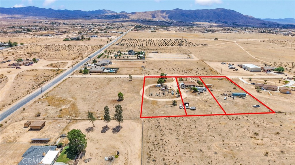Fixer package deal! Investor package purchase. This house is an ideal candidate for a flip. Note that the properties on BOTH sides of this house are included: APNs 3080-042-15 and 3080-042-17. Must be sold together. This home is a great find in that it is connected to natural gas, and a private well. The house is the third parcel in from PAVED Joshua Road. This area is built out with custom estate homes. The location is ideal in that it is right off of Bear Valley Road. Shopping, home improvement, conveniences, and big box retail are already in the area nearby, with two more shopping centers currently under construction. This is an incredible opportunity to fix and flip, build, renovate and hold...check it out and see how it fits in with your portfolio. Cash only, no seller carry.