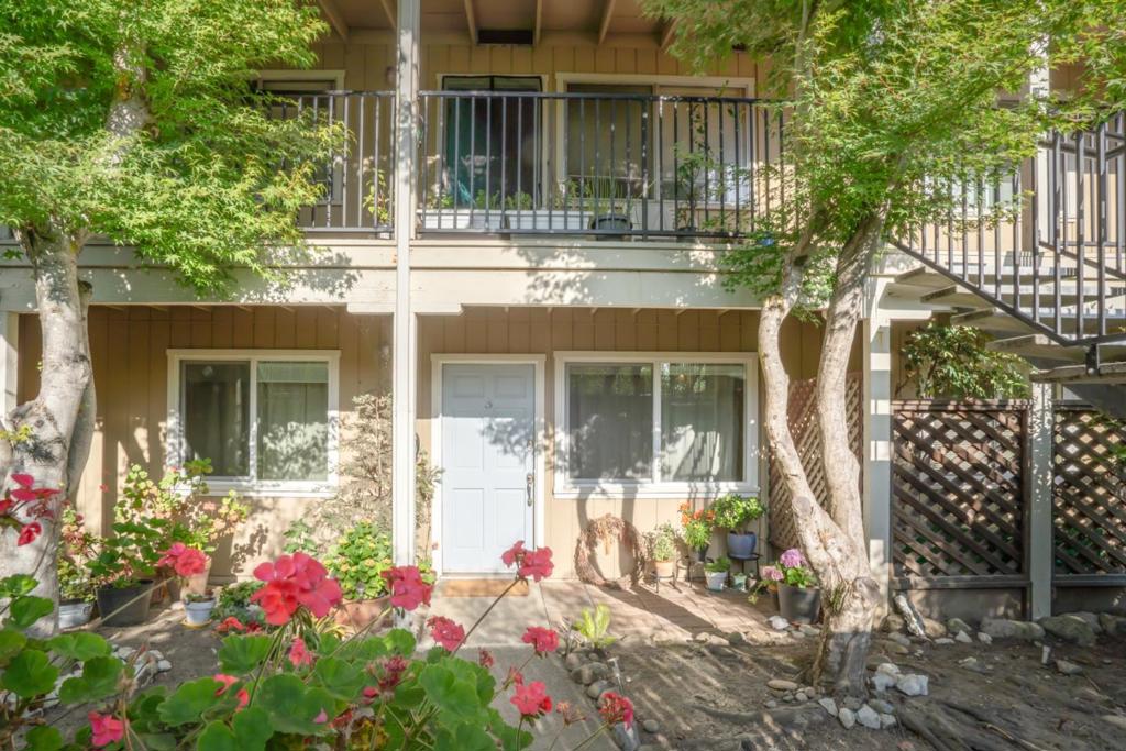 Live the dream just blocks from the beach in this cozy inviting updated condo. Wake to fresh ocean air, grab your board or your coffee, and be on the sand within minutes. Walk to your favorite cafes, breweries, shops, and coastal trails no car required (but there's a reserved carport if you want one). This well-loved home has been thoughtfully updated over the years with dual-pane windows, newer appliances, laminate flooring, a rebuilt hall closet, and fresh mechanicals like the wall furnace and water heater. Enjoy the ease of single-level living in a small, quiet complex with low dues. Whether you're looking for a dreamy first home, a weekend surf pad, or a place to downsize with style, this is where Santa Cruz living happens: casual, coastal, and entirely walkable/ridable/stroll able. Staged Virtually.