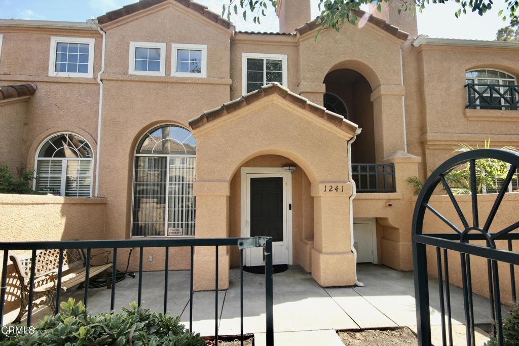 Beautiful 2+2.5 townhome with a loft situated in a desirable gated community in the California Lighthouse tract. Its open and airy floor plan features a spacious living room and dining area with a cathedral ceiling and fireplace. Additionally, it boasts upgraded hardwood flooring, ceiling fans, and a well-appointed kitchen equipped with stainless steel appliances and a breakfast bar. You'll appreciate the convenient location and proximity of nearby schools, Oxnard Civic Center, and the beach, providing residents with an ideal blend of urban amenities and coastal access.