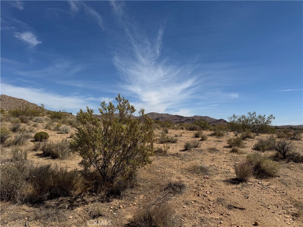 Discover a unique opportunity to own 10 expansive acres of prime desert land near the iconic Willow Springs International Raceway. Situated just minutes from Rosamond and a short drive from Lancaster or Palmdale, this parcel is perfect for motorsport enthusiasts, developers, or investors seeking space, privacy, and stunning scenery.
This lot offers plenty of flexibility. Whether you envision a private retreat, off-grid escape, or future development project, the possibilities are wide open. Proximity to local amenities make this a rare blend of seclusion and convenience.