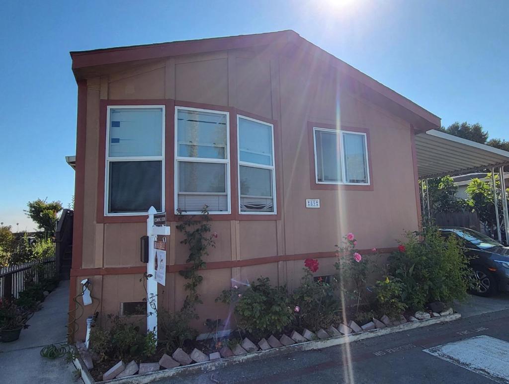 Welcome to your new home! This spacious 3-bedroom, 2-bathroom mobile home offers comfort, convenience, and community living at its best. This property also features a good size kitchen, with a separate dining room, a breakfast bar, an oversize car carport with room for 3 cars, a private back patio and a good size storage shed. This unit is Located in a desirable all-age park, you'll enjoy easy access to shopping, dining, schools, public transit, and more, everything you need is just minutes away!