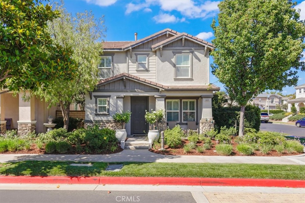 Live in the Heart of Valencia! This cozy home is tucked away in the popular Creekside community—just minutes from top-rated schools, shopping, and dining at Bridgeport Marketplace. Enjoy tree-lined streets and scenic paseos right across the street—great for biking, jogging, or evening strolls. Set back from the main roads, the home offers a private feel with a two-car garage and convenient indoor laundry room. Inside, you’ll find stainless steel appliances, dark wood cabinets, tile flooring, copper plumbing, dual-pane windows, and shutters throughout. Located on the cute sideyard area, there’s a covered patio—perfect for BBQs, relaxing, and outdoor hangouts—with space for a mini garden to grow your favorite plants. The patio also offers direct access to the garage side door and a wooden gate that opens to the driveway. All this with a low HOA! Link here for Virtual Tour: https://my.matterport.com/show/?m=k14QstM21WZ&title=0&brand=0