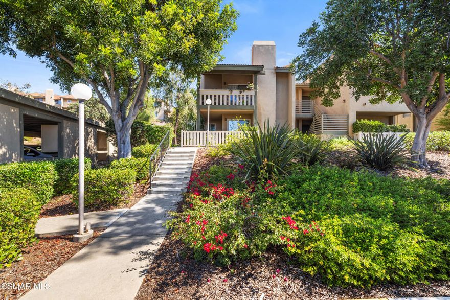 Location! Location! Location! Tucked away in a quiet and serene setting, this ground-level corner unit is situated in the highly desirable,  active 55+ Oaknoll Villas community -- perfectly located near all the best Thousand Oaks has to offer! This spacious 2-bedroom, 2-bath home lives like a single-family residence, featuring a formal living and dining area, a cozy family room with fireplace, and an oversized patio with green space - ideal for relaxing outdoors or spending time with your four-legged companion. Freshly painted with smooth ceilings, updated dual-pane windows, and an upgraded HVAC system, the home also includes in-unit laundry with a washer, dryer, and refrigerator included for your convenience. The vibrant community offers a clubhouse with a sparkling pool, spa, fitness center, yoga studio, library, billiard room, shuffleboard courts, banquet room with full kitchen, outdoor grilling area, and beautifully landscaped grounds. Your covered carport with private storage is conveniently close, with ample guest parking nearby. HOA amenities include trash service, cable/internet, landscape maintenance, and onsite management for your convenience. Close to shopping at The Oaks Mall, restaurants, theaters, grocery stores, the Conejo Valley Botanic Garden, and public transportation - this home and community offers the perfect blend of comfort, convenience, and active living.