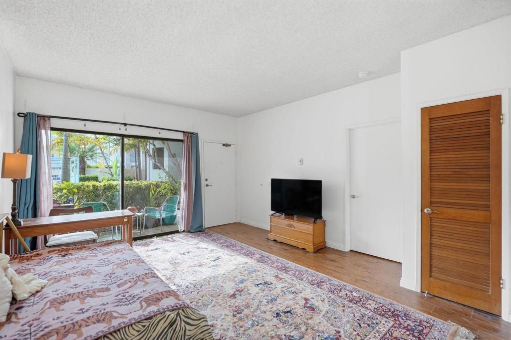 Photo of 8310 Regents Rd Rd #1E, San Diego, CA 92122 (MLS # 250044692SD)