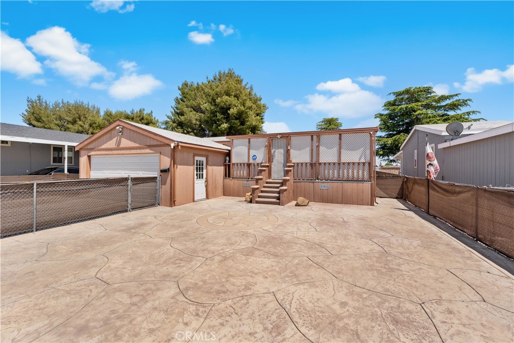Stunning 2001 Mobile Home, features 3 bedrooms, two full bathrooms, 1400 sf of living area. Spacious formal living room and family room. Open kitchen with center island. Master bedroom is opposite the two bedrooms, offers dual sink, standing shower and separate jacuzzi/spa. Chain link fence for privacy. This community offers a number of amenities including swimming pool, basketball courts, gym, recreational room, RV/Boat storage, and 24-hour security, plenty of visitors parking. Feel free to Visit the park's website at https://www.lancasterestatesmhp.com Ready for immediate occupancy