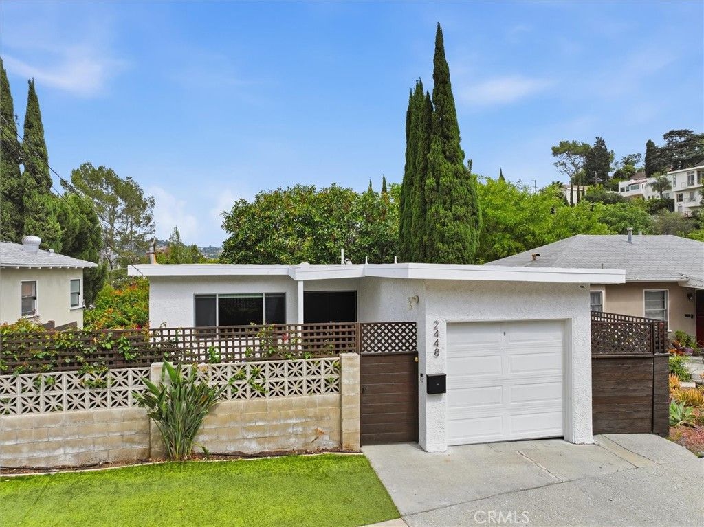Photo of 2448 Riverside Pl PL, Los Angeles, CA 90039 (MLS # SB26107619)
