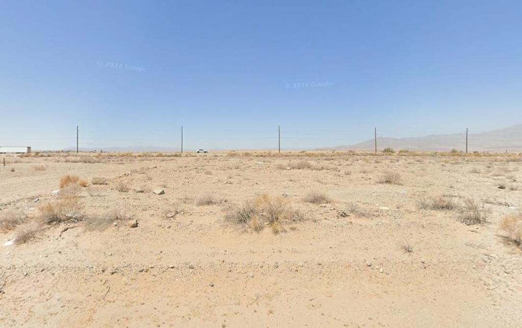 COMMERCIAL LOT- Great opportunity to invest in an up and coming area of California known as ''Lithium Valley'' This great vacant lot located East of HWY 86 with water and sewer. This is your chance to buy and hold for future appreciation. Whether you are planning to build a home or planning to sell for future value you can't go wrong. With beautiful views of the mountains and the Salton Sea and amazing sunrises and sunsets you will enjoy owning your own piece of land in this area that has tremendous potential. Hurry, don't miss your chance to see development happen before your very own eyes. Buyer and Buyer's agent to do their own due diligence Seller and seller's agent makes no warranties or representations about the land, Near elementary and high schools, close to Family Dollar, Dollar General, restaurants, and gas stations. Lot next to it is available, purchase both for $13,000