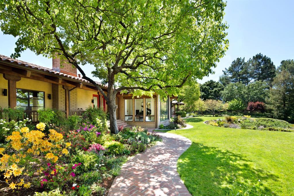 Surrounded in complete privacy on ~3 acres ~ recently renovated 5bd/4.5ba home plus 1bd/1ba guesthouse ~ extraordinary sophisticated interior design ~ open and flowing spaces are bright and light with numerous skylights, French doors and massive walls of windows that present the sweeping views ~ neutral palette of white and creme contrasts beautifully with the walnut flooring throughout ~ Gorgeous grounds with pool and spa ~ Western mountain views ~ acclaimed Woodside school ~ one-half mile to Woodside village, 3 miles to Sand Hill Road, 4 miles to Stanford University, easy access to highway 280 and 2 international airports