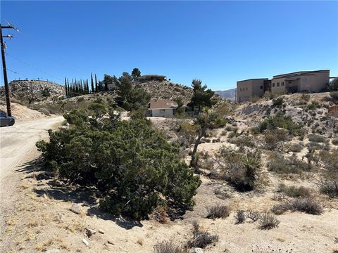 Photo of 2 Buena Suerte Road, Yucca Valley, CA 92284 (MLS # JT25048194) Photo of 2 Buena Suerte Road, Yucca Valley, CA 92284 (MLS # JT25048194)