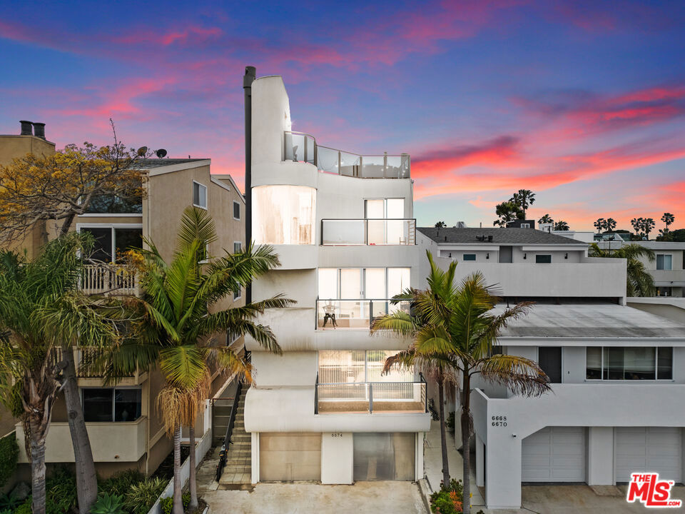 Designed by renowned architect Eric Owen Moss in 1977, this property was one of his first-ever architectural masterpieces, showcasing his bold, innovative vision. Featuring a 2-bedroom, 2-bathroom unit on the lower level, a 1-bedroom, 2-bathroom unit in the middle, and a luxurious 1-bedroom, 2-bathroom penthouse with a stunning top deck offering panoramic views, the property combines innovative design with modern living. Meticulously maintained and thoughtfully upgraded, the property features all-new copper plumbing, new Navien tankless water heaters, a fresh exterior repaint, new appliances, and updated flooring. Additional enhancements include roof repairs, comprehensive pest control, and a private hot tub for the downstairs unitoffering a truly turn-key living experience. Ideally situated just minutes from the beach and within close reach of shops, restaurants, and everyday conveniences, this property offers both a unique living experience and a rare income-generating opportunity. 6672 Vista Del Mar stands out as a true architectural gem in the heart of Playa del Rey.