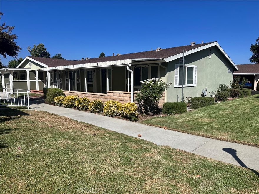 Light and bright single-story end unit located in the desirable guard-gated 55+ community of Friendly Valley. This 2 bedroom 2 bathroom home features a spacious floor plan with updated laminate flooring, fresh paint, dual-pane vinyl windows, French doors to the second bedroom, indoor stacked laundry, and a walk-in stand-up shower in the main bathroom. Enjoy a cozy covered patio very close to the clubhouse and guest street parking. Community amenities include a newly refurbished pool and spa, auditorium, clubhouse, exercise room, game room, woodworking and ceramics studios, shuffleboard, horseshoes, basketball, picnic and BBQ areas, lawn bowling, and two golf courses. The HOA covers trash, water, hot water, sewer, building and roof maintenance, landscaping and gardener services, insurance, a special cable TV package, and more. Friendly Valley offers gated entry with 24/7 guard and patrol for comfort and peace of mind.