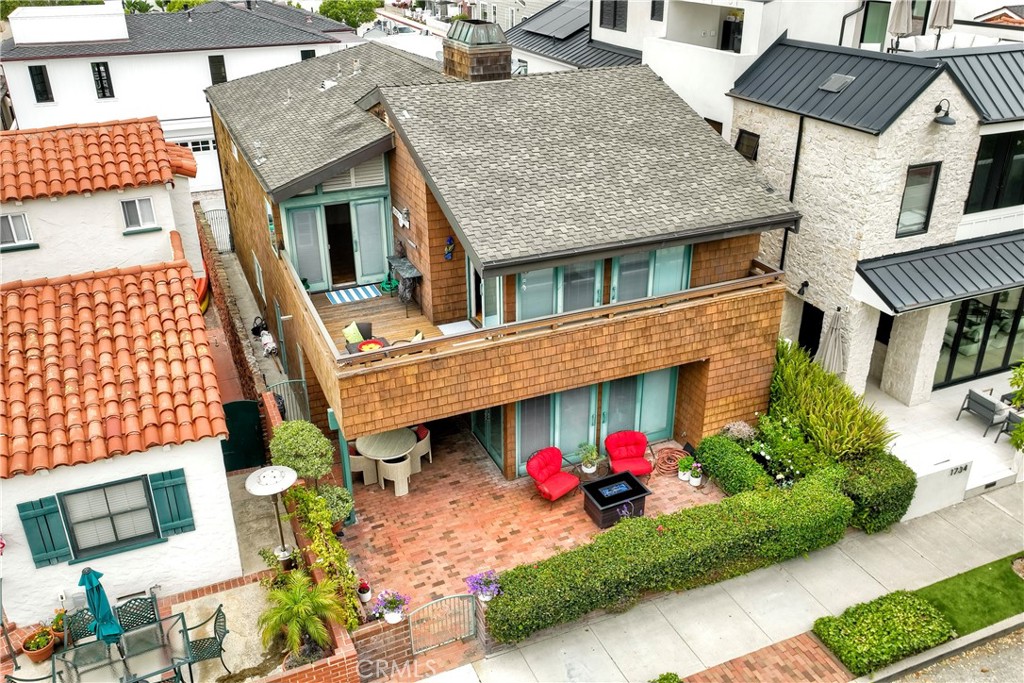 AVAILABLE NOW, A TRULY EXCEPTIONAL RESIDENCE & OPPORTUNITY TO LIVE ON ICONIC, COVETED BALBOA PENINSULA POINT. SITUATED AT THE WESTERNMOST END OF THE PENINSULA, THIS EXCLUSIVE ENCLAVE IS RENOWNED FOR ITS UPSCALE, MULTI-MILLION DOLLAR RESIDENCES, THIS HOME PROVIDES AN UNPARALLELED STANDARD IN BEACH HOUSE LIVING WITH BEACHES JUST STEPS AWAY. ENJOY VIBRANT DINING, BOUTIQUE SHOPS & FASHION ISLAND. A RARE FIND, HOME DIRECTLY FACES A BEAUTIFUL PARK & IS A SHORT STROLL TO THE FAMOUS WEDGE, PRO SURF SPOT. ENTER THROUGH AN ENTRANCING FRONT PATIO ENCLOSED BY GARDENS & WAIST HIGH FENCING, OVERLOOKING THE PARK. WITH AMPLE SPACE FOR BBQ’S & OUTDOOR DINING, THIS FETCHING PATIO WILL BE A FAVORITE SPOT TO RELAX AND UNWIND. SIDE WALKWAYS LEAD TO THE REAR OF THE HOME & A PRIVATE 3 CAR GARAGE. ONCE INSIDE, THE OPEN CONCEPT FLOORPLAN BLENDS THE GREAT ROOM, DINING ROOM, KITCHEN & ENTRY SEAMLESSLY, ALL CONNECTED & ANCHORED BY A DRAMATIC DUAL SIDED FIREPLACE. A WELCOMING ATMOSPHERE THRU-OUT IS ENHANCED BY THE CUSTOM WINDOWS & FRENCH DOORS. THE KITCHEN INVITES AN ATMOSPHERE OF SHARING MEALS & VISITING WITH THE CHEF WHILE SETTING AT THE EXPANSIVE BREAKFAST BAR. AN ABUNDANCE OF CABINETRY & GRANITE TOPPED COUNTERTOPS ADD TO THE CAPTIVATING SETTING. A GRACEFUL STAIRWAY, BORDERED BY A BEAUTIFULLY CRAFTED STAIR RAILING, LEADS TO THE SECOND LEVEL, SHOWCASING BEAUTIFUL WOOD FLOORING. HERE, A STUNNING PRIMARY SUITE AWAITS, FEATURING A NEWLY BUILT, LUXURIOUS EN-SUITE BATH, COMPLETE WITH AN EXPANSIVE, WALK-IN SHOWER ENCLOSED IN SLEEK FRAMELESS GLASS & ACCENTED BY ARTFULLY DESIGNED STONE WALLS. DUAL SINKS, ELEGANT LIGHTING & DRESSING TABLE. AMPLE CLOSET SPACE INCLUDES TWO MIRRORED WARDROBES ALONG WITH AN OVERSIZED HIGH-END BI-FOLD CLOSET. BEAUTIFUL CUSTOM WOOD DOORS OPEN ONTO THE PICTURESQUE & GENEROUS VERANDA, PERFECT FOR ENJOYING MORNING COFFEE & EVENING REFRESHMENTS, WITH SWEEPING VIEWS OF THE PARK, SUNSETS AND TREE-TOP OCEAN VIEWS. A FOURTH BEDROOM ALSO OPENS TO THE VERANDA & IS CURRENTLY USED AS A DEN. THIS BEDROOM COULD SEAMLESSLY SERVE AS AN EXTENSION OF THE PRIMARY SUITE OR A VERSATILE INDOOR-OUTDOOR LOUNGE ADJOINING THE VERANDA. ALL BEDROOMS ARE OF EXCEPTIONAL SIZE, AND MOST ROOMS OF THE HOME OFFER RECESSED LIGHTING & CUSTOM FANS. DUAL ZONED A/C ADDS EASE OF LIFESTYLE AS DOES THE COOL OCEAN BREEZES FOUND ON BOTH LEVELS OF THIS RESIDENCE. THE OVERSIZED TWO CAR GARAGE OFFERS EPOXY FLOORING & AN ABUNDANCE OF STORAGE. INVITING YOU TO COME SHARE IN THIS ONCE IN A LIFETIME OPPORTUNITY!