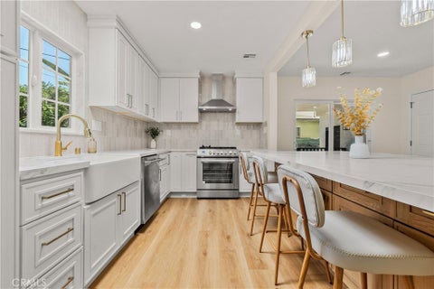 Photo of 7732 Garden Grove Avenue, Reseda, CA 91335 (MLS # PF26194431)