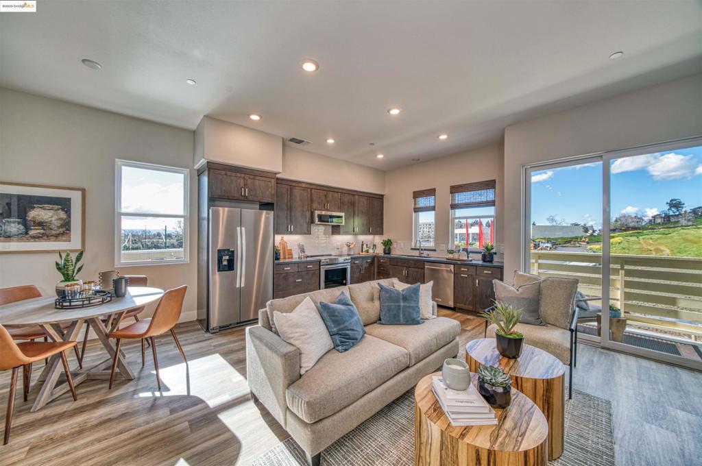 Brand New 1,563 square foot townhome style. 3 bedrooms, 3 full baths. Popular open floor plan concept. Beautiful interior finishes. High ceilings. Large Master bedroom with 12 feet ceiling, fits a king size bed with two 36 inch night stands. 2-Car tandem Garage with interior access. Highly desirable community with a beautiful hillside backdrop, overlook park and dog park with a public walking trail within the community. Great location! Short walk to BART. Easy access to 880 and 580. Close by shopping and restaurants. This home is located at SoMi HayPark, our popular Plan 1 Hayward, CA 94544.