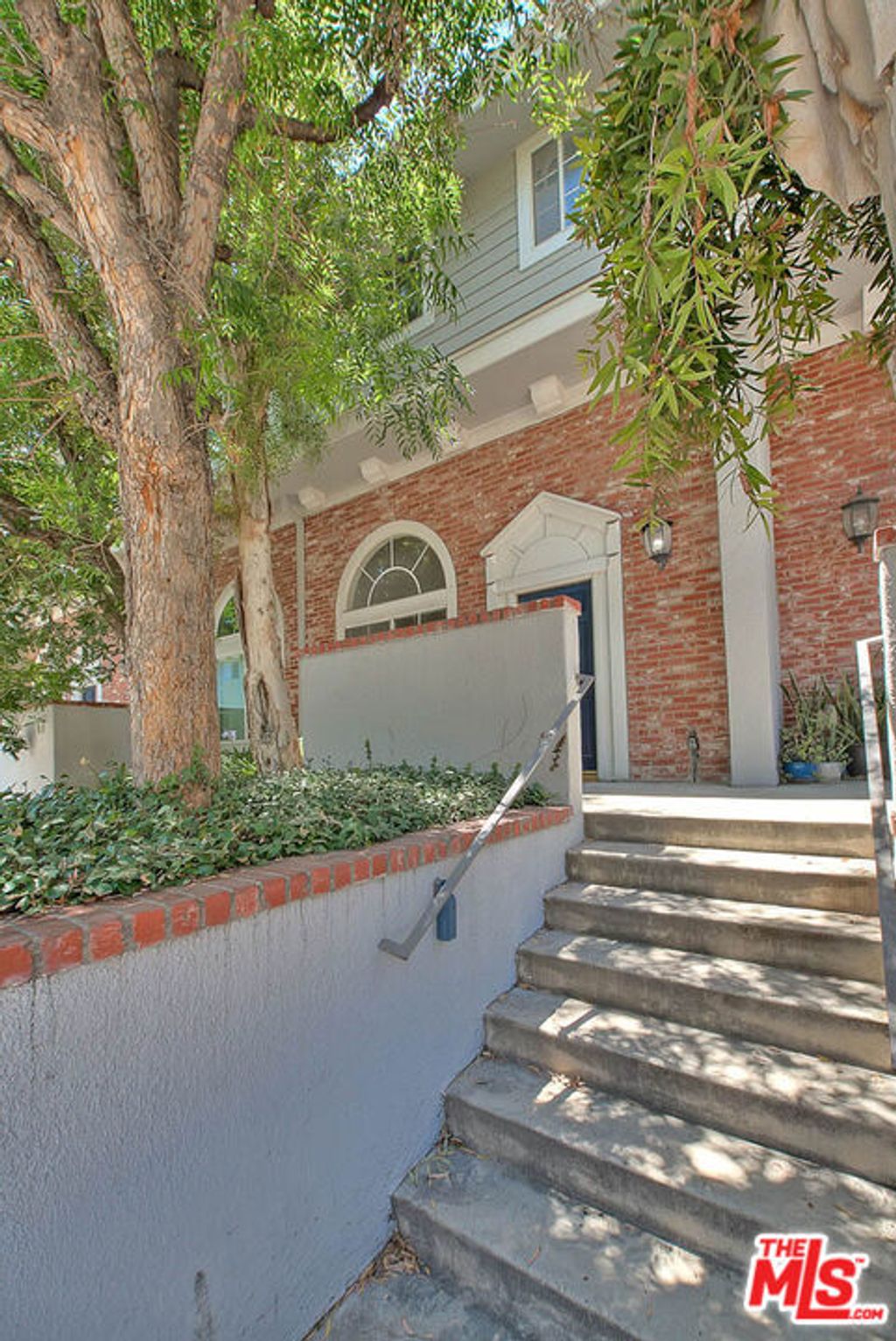 Photo of 8741 Darby Avenue #16, Northridge, CA 91325 (MLS # 25603535)