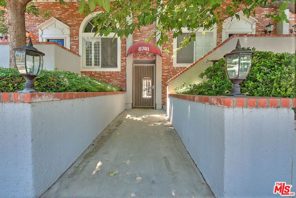 Photo of 8741 Darby Avenue #16, Northridge, CA 91325 (MLS # 25603535)