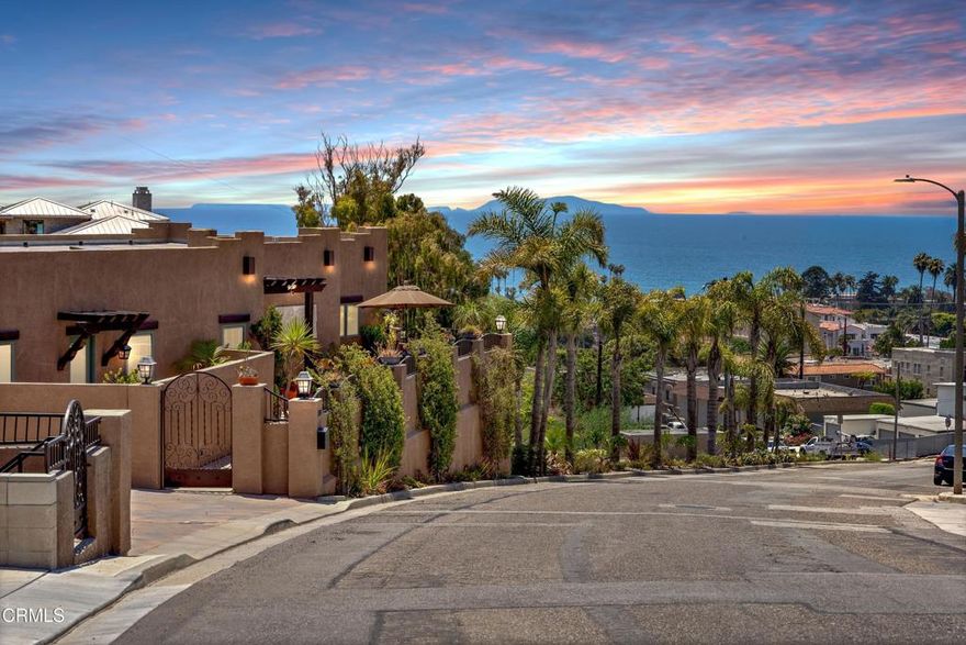 Just above downtown Ventura and the beach, this custom-built coastal home showcases panoramic ocean, island, and city-light views. With a coveted vacation rental permit, it's been enjoyed as both a second home and a successful short-term rental--offering flexibility, income potential, and the perfect turnkey getaway.The open-concept great room blends dining, kitchen, and living spaces, all opening to a view deck made for morning coffee or sunset cocktails. Quality craftsmanship is evident throughout--from the travertine-accented fireplace to Brazilian cherry hardwood floors, Pella windows and doors, custom alder cabinetry, and Viking appliances. A grand entry reveals soaring ceilings, a wrought-iron staircase, and natural light at every turn.On a generous 11,712 sq. ft. lot, this low-maintenance property is in impeccable condition and offers exciting potential to expand outdoor living space or develop the lower hillside level--maximizing the already breathtaking views.