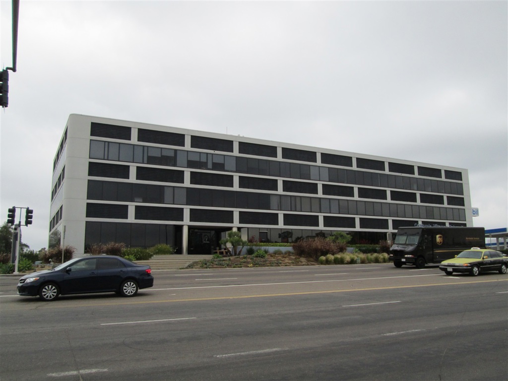 Stop paying rent and own your office. Here is a beautiful office condo on the first floor of a highly upgraded building. This suite is beautifully appointed; built-out with perimeter offices, a rock wall entry, solid wood flooring and granite counters. There are three sinks, carpeted and tiled offices, hi-tech lighting and newer HVAC. The suite is located off the main lobby with a glass entry door and side-light. You have 24 hour access from either the assigned, underground parking, or the parking lot. There are common area restrooms and an elevator from the garage. Association dues are only .35 per square foot and they have not increased in eight years. There are very strong reserves and the project has a history of maintaining expenses below budget. This project is located just west of the I-15 freeway at Miramar Rd. A very visible property at a signalized corner. Don't miss this rare opportunity to own your office.