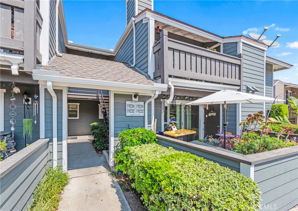 Discover comfort and convenience in this beautifully cared-for upper-level condo located in the heart of Yorba Linda. This 2-bedroom, 2-bath home offers a bright and open floor plan with serene tree-lined views that create a peaceful retreat. The living room features a warm fireplace and flows effortlessly into the dining area and kitchen, complete with clean white cabinetry and stainless steel appliances. Both bedrooms are spacious with walk-in closets, providing plenty of storage. The primary bedroom has its own en-suite bathroom, while the secondary bedroom enjoys private access to the hallway bath, perfect for guests or a versatile home office. Enjoy your morning coffee or unwind in the evening on the private balcony, which also features a laundry closet with washer and dryer hookups for added convenience. Situated in a quiet, well-maintained community with lush landscaping, this home is just minutes from shopping, dining, parks, and top-rated schools. A perfect opportunity for those seeking low-maintenance living in a prime Yorba Linda location.