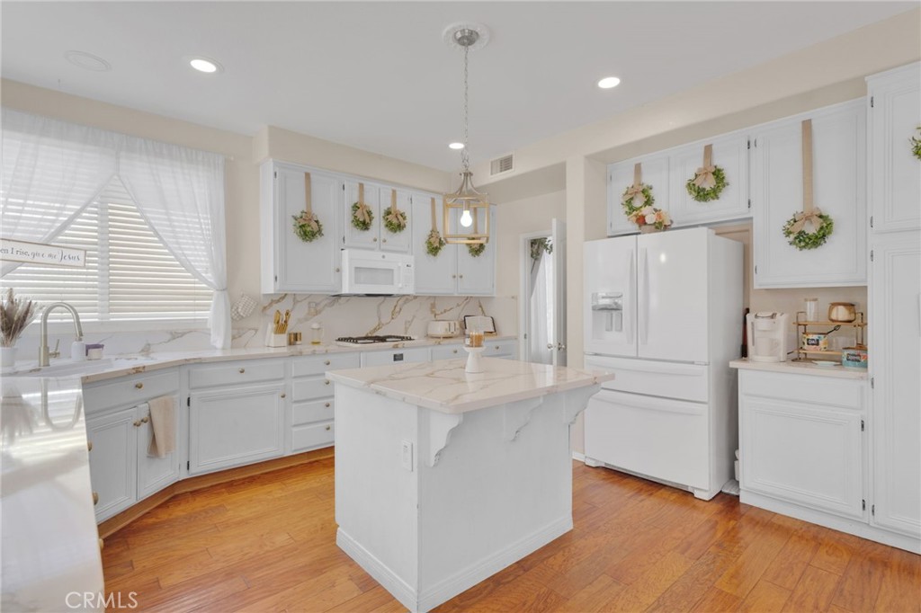 Welcome to 42257 Sand Palm, a spacious 4-bedroom, 3-bathroom home located at the end of a quiet cul-de-sac in Lancaster. This property offers a blend of comfort, function, and upgrades that make it a standout in today’s market. From the moment you arrive, the three-car garage and inviting curb appeal set the stage for what’s inside.
The interior is designed with both everyday living and entertaining in mind. Hardwood flooring runs throughout the main living areas, creating a warm and durable foundation. The main level includes a versatile den, perfect for a home office, media room, or additional living space. The kitchen has been tastefully updated with marble countertops and ample cabinetry, creating an ideal space for cooking, dining, and gathering. The open layout connects the living, dining, and kitchen areas seamlessly, offering both convenience and comfort.
Upstairs, the primary suite serves as a true retreat. It features a spacious layout, dual walk-in closets, and a large ensuite bathroom designed for relaxation and privacy. The additional bedrooms are generous in size and filled with natural light, while the bathrooms throughout the home are updated with modern finishes that add style and function.
The backyard provides plenty of room for outdoor living and entertainment. Its location at the end of the cul-de-sac enhances the sense of privacy, while the open space offers flexibility for gardening, hosting gatherings, or creating your own outdoor retreat. With minimal traffic in the neighborhood, it is a peaceful setting to enjoy California living.
One of the key highlights of this home is the fully redone electrical system, updated by the current owner, a professional electrician. This thoughtful improvement adds peace of mind and value for the next homeowner. Combined with the spacious three-car garage, ample storage, and a flexible floor plan, this home is well-suited to meet a variety of needs.
42257 Sand Palm is move-in ready and positioned in a desirable location that offers both comfort and convenience. With its upgraded systems, large interior and exterior spaces, and quiet cul-de-sac setting, this home is an excellent opportunity for buyers looking for quality and value in Lancaster. Schedule your private showing today and see everything this home has to offer.