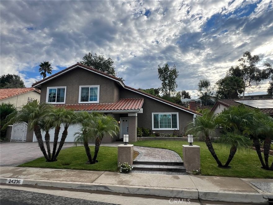 Welcome to this beautiful and spacious Madrid home in the heart of Mission Viejo!

Nestled on a generous lot, this residence offers striking curb appeal and a thoughtfully designed floor plan that’s perfect for comfortable living and entertaining. Step inside to a dramatic entryway featuring soaring cathedral ceilings and elegant stone-tiled flooring. The inviting living room is spacious and anchored by a cozy fireplace, while the adjacent formal dining area is ideal for gatherings. The updated kitchen boasts an island, custom cabinetry, and newer appliances, along with a charming breakfast nook that flows into the family room. The family room overlooks the expansive backyard and features a second fireplace for added warmth and ambiance. Upstairs, the primary suite offers a peaceful retreat with a Juliet balcony overlooking the backyard. It features a custom walk-in closet and a beautifully updated en-suite bathroom with dual sinks, newer cabinetry, and a walk-in shower. Two secondary bedrooms, both with custom closets, share an upgraded hall bathroom. Additional highlights include an attached two-car garage with abundant storage, a large backyard with a spacious patio for entertaining, an in-ground spa, fruit trees, and plenty of privacy. Residents enjoy access to Lake Mission Viejo membership, which includes two private beach clubs with sandy beaches, movie nights, concerts, picnic areas with BBQs, a clubhouse, and boat rentals. Nearby amenities include top-rated schools, parks, hiking trails, shopping, medical facilities, and convenient freeway access. The YMCA and Nadadores swim and dive complex are just around the corner. Don’t miss this incredible opportunity to lease a beautiful home in one of Mission Viejo’s most desirable neighborhoods!