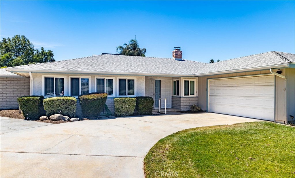 Welcome to Nottingham Drive.
Give yourself the gift of owning this lovely well taken care of home. Situated in the desirable location of REDLANDS. You will enjoy the close distance to amenities such as Downtown Redlands, Redlands Community Hospital, Gerrard's Neighborhood Market, Smiley Elementary and Cope Middle School, Loma Linda University Medical Center and the Redlands VA Hospital.
This practical single story home offers a functional floorplan with endless possibilities for you to utilize the space to fit your LIFESTYLE. Spend summer cooling off in your very own PRIVATE backyard with your private swimming pool and a year-round spa. Mature landscaping which includes roses, fruit trees, evergreen boxwoods and much more!
Entertain under the covered patio while you grill meals, and watch the family, pets, and friends play on the grassy separate lawn. The backyard is spacious enough to possibly add an ADU if you so desire. A cost saving home with dual pane windows, newly painted exterior, newly painted bedrooms and hallway. The kitchen is cozy with a built in stovetop, a built in wall oven and a breakfast nook. The formal dining room area is next to the kitchen with a view to the sparkling pool. Plenty of cabinetry for storage, and low maintenance tile flooring in the entry, kitchen and Den, which has a fireplace. Double door entry with security iron doors which allow you to keep open to let the fresh air in. The bathrooms have tile showers , tile flooring and the master bathroom has a window and the hall bath has a skylight. In addition to the entry coat closet, you'll appreciate the large hall linen closet, and for even more storage you have the garage. The service side door also has a security iron door allowing the garage to be aired out. A bonus is the extended -concrete driveway to accomodate multiple cars. Truly A MUST SEE HOME!!! Bring your PRE-APPROVED BUYERS!