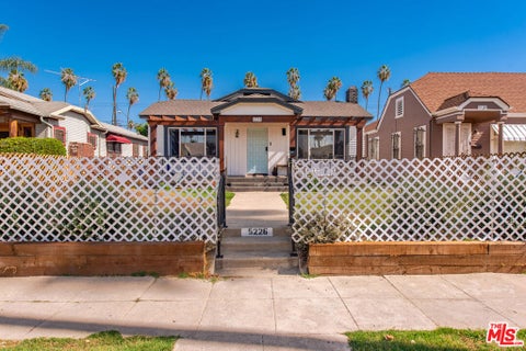 Photo of 5226 S Wilton Place, Los Angeles, CA 90062 (MLS # 26105585)