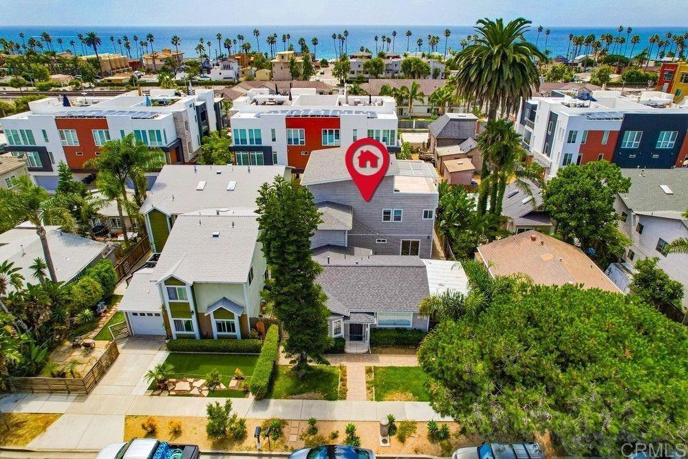 Incredible investment opportunity in coastal Oceanside! This updated 3-Unit property features an expansive 3rd story balcony with ocean views. All three units are in excellent, upgraded condition. Unit 1 is the detached, single-story front house consisting of 2 bedrooms and 1 bathroom with private laundry. Unit 2 is a ground level, single-story unit with 1 bedroom and 1 bathroom. Unit 3 (vacant) is a huge 3-story unit with 2 bedrooms, 2 full bathrooms, private laundry, and the Ocean View deck. The garage is divided into one single-car garage and one large 2-car garage with laundry hookups. Located in Coastal Oceanside within walking distance to great dining, shops, gyms, and the beach. Bank owned property - landlord expenses unknown. Units 1 & 2 are tenant-occupied. Cash Buyers only.