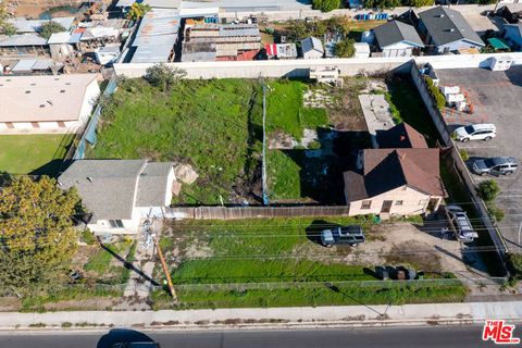 Photo of 1230 S Wilmington Avenue, Compton, CA 90220 (MLS # 25627013)