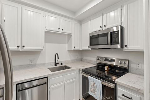 Photo of 1682 Circa Del Lago #A308, San Marcos, CA 92078 (MLS # ND26056492)