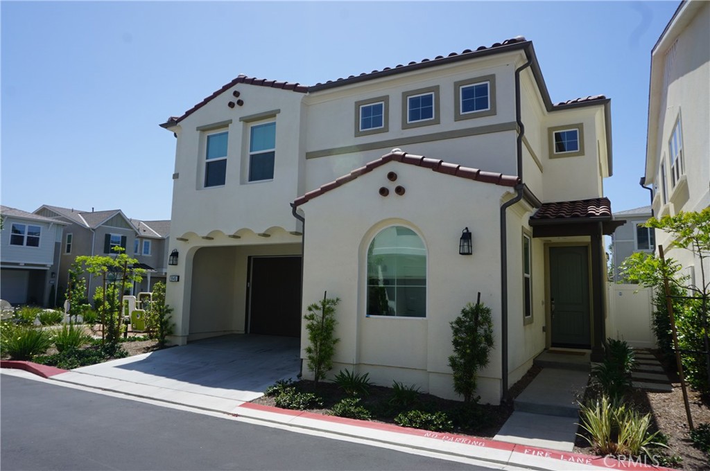 Beautiful and spacious detached home in the newly built Elara community in Costa Mesa. With 4 bedrooms, a separate loft and 3 bathrooms this lovely home features a downstairs bedroom with en suite bathroom, open kitchen with large center island, quartz countertops, stainless steel appliances and custom cabinetry. Additional features include a primary bedroom with huge walk in closet and deluxe bathroom with huge shower and dual vanities, washer/dryer room with utility sink, extensive recessed lighting, 2 car garage with direct access, water softener and a private rear yard with interlocking paver patio and artificial turf. The Elara Community is minutes away from the Orange County Fairgrounds, South Coast Plaza, John Wayne Airport, shopping, dining and entertainment. HOA features a tot lot with a barbecue area. Owner pays for HOA. Washer, dryer and refrigerator are included. No smoking on the premises. Small pet under 25 pounds will be considered. Renters insurance is required.