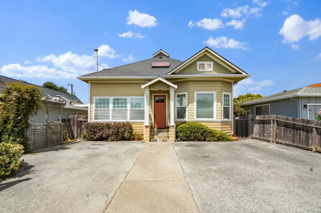 Just moments from vibrant downtown Half Moon Bay, 575 Myrtle Street blends the coastal charm of a single-family home with the rare versatility of a legal triplex. Imagine living in one unit while generating income from the others or creating the ultimate multi-generational retreat with private spaces for everyone. Each of the three self-contained units offers its own entrance, kitchen, and living area, giving the property incredible flexibility. The two front units highlights the original homes character with bright, sun-filled interiors, while the top unit provide stylish, comfortable living. Outdoors, a shared backyard offers room to relax, garden, or entertain, complemented by ample off-street parking. With beaches, trails, cafés, and Main Street just minutes away, this property delivers a unique combination of lifestyle, location, and income potential on the coast.