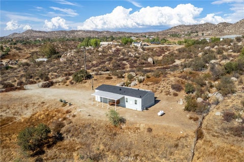Tiny photo for 34053 Buckboard TRL, Nuevo, CA 92567 (MLS # OC26199825)