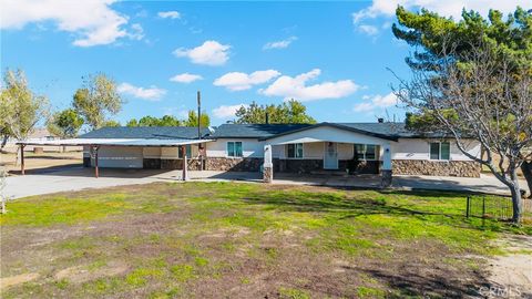 Photo of 9888 Trinity Rd, Oak Hills, CA 92344 (MLS # DW25267961)