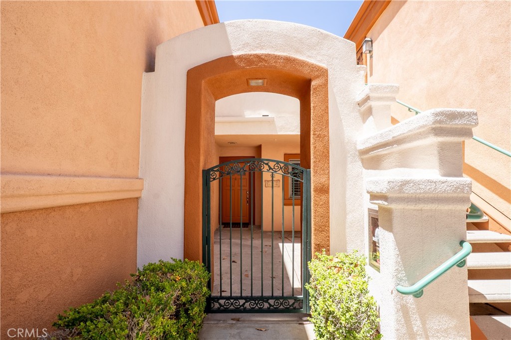 92 Villa Point has it all - end unit, gated entry, pool, gym, single level, 2 primary suites, vinyl floors, little grassy garden backyard, fireplace and an attached 1 car garage! Desirable private floorplan (attached) has the suites on either side of the living room. Just updated with new floors and paint. It's located near Balboa Island, Fashion Island and CdM. It's a wonderful place to call home! Available for the first time in 10 years - the last tenants stayed that long.